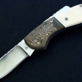 F32 - Damascus and Ivory Folder $750.00